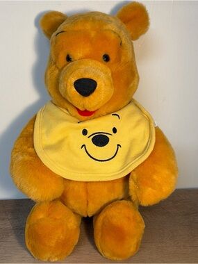 Walt Disney Winnie the Pooh Plush Bear with Yellow Pooh Bib